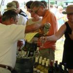 Ollie Sr. Pouring at a Wine Festival